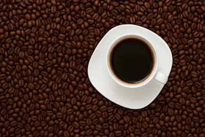 Medium-dark roast coffee with beans